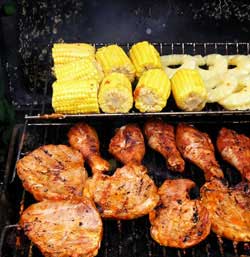 Meat and corn on a grill